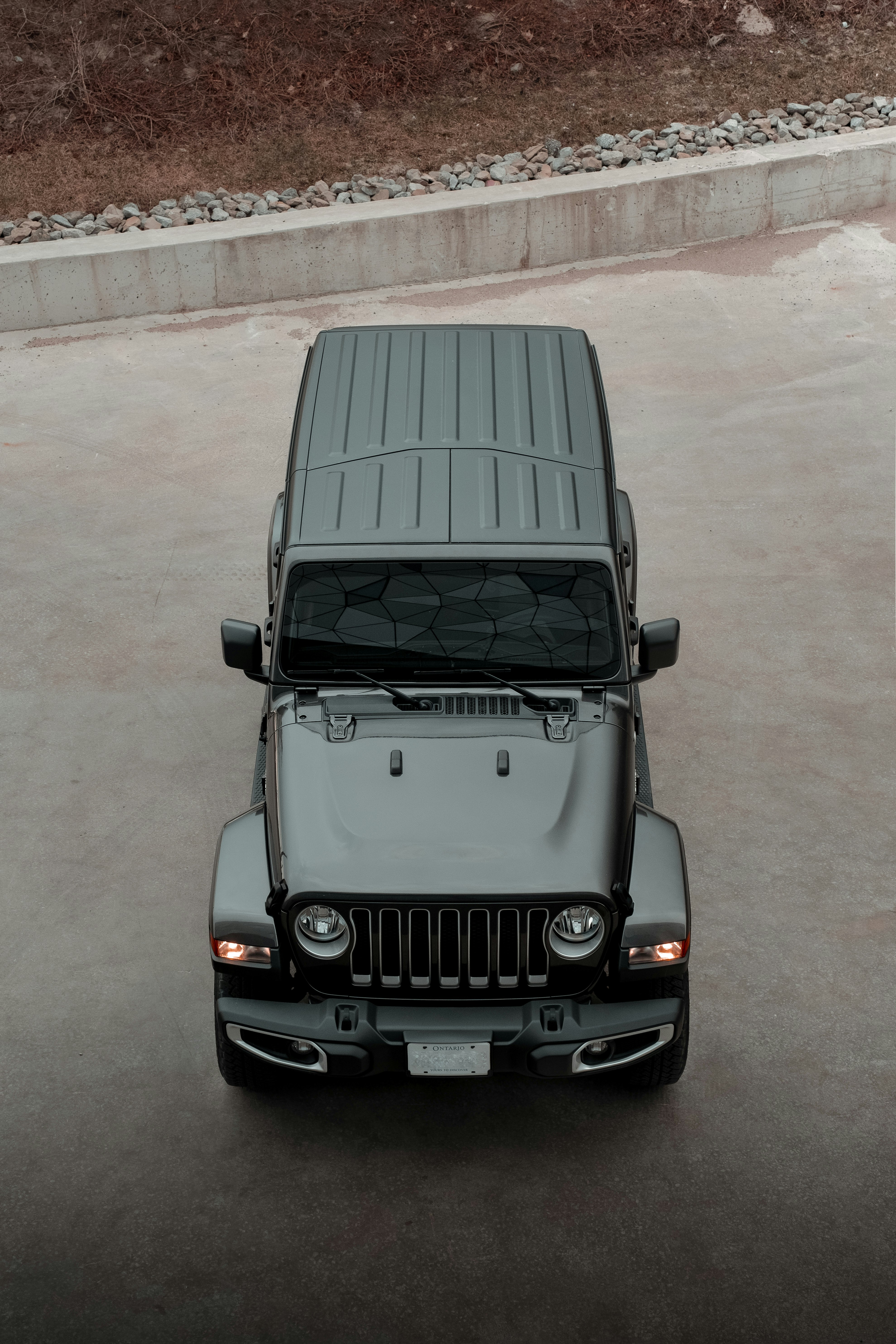 black mercedes benz g class on gray concrete road